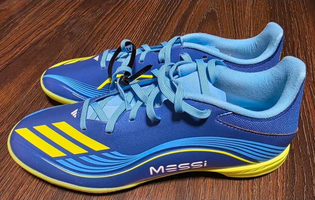 New Adidas F50 Messi League turf soccer shoes in blue and yellow