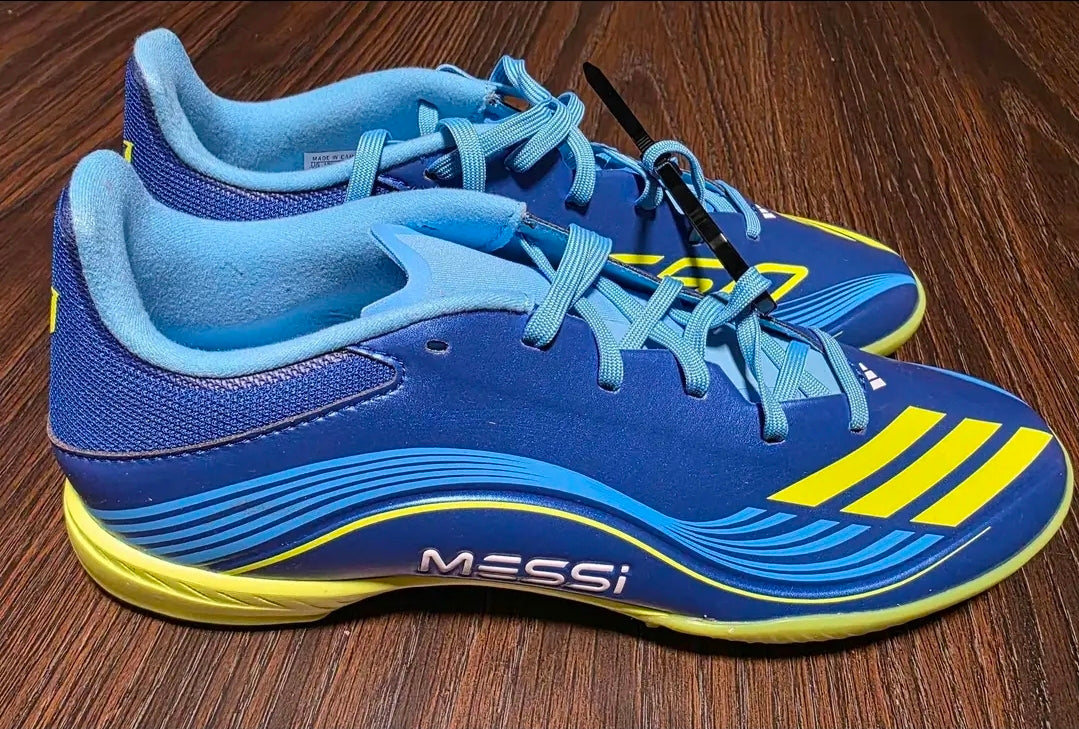 New Adidas F50 Messi League turf soccer shoes in blue and yellow