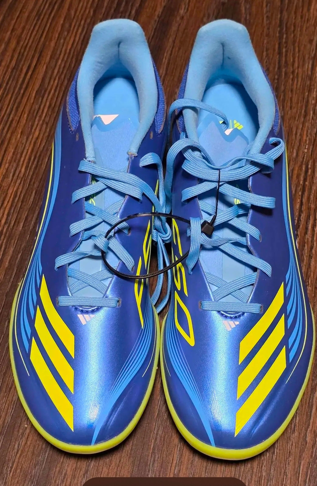 New Adidas F50 Messi League turf soccer shoes in blue and yellow